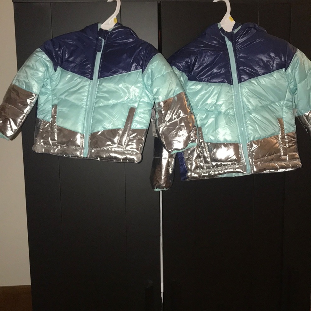 2 baby puffer jackets.